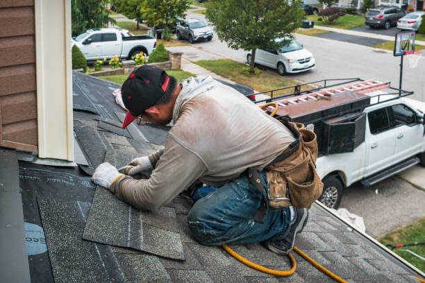 Professional Emergency Roof Repair technician working in Monroeville, OH